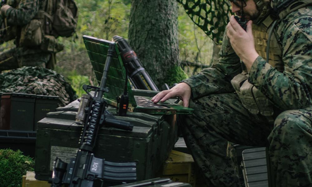 military using computer in the field